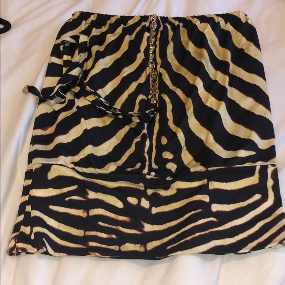 Zebra cache tube top